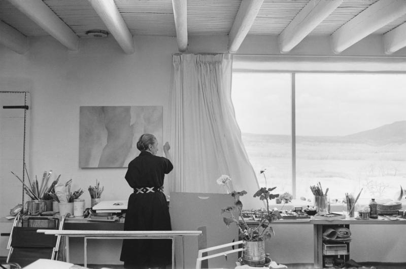 Tony Vaccaro, O'Keeffe Opening the Curtains of her Studio, 1960